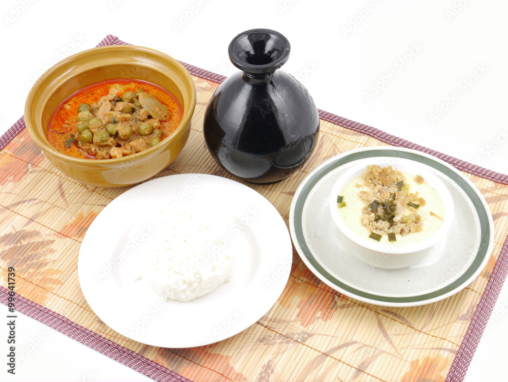 Thai steamed eggs pork chop with pork curry rice set . Thai steamed eggs pork chop with pork curry rice set .