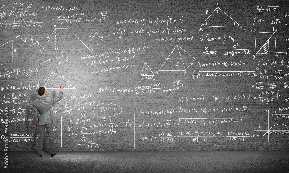 Student or teacher at blackboard Student or teacher at blackboard