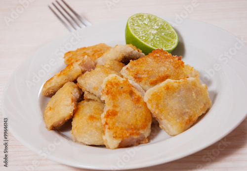 fried pieces of fish fillets