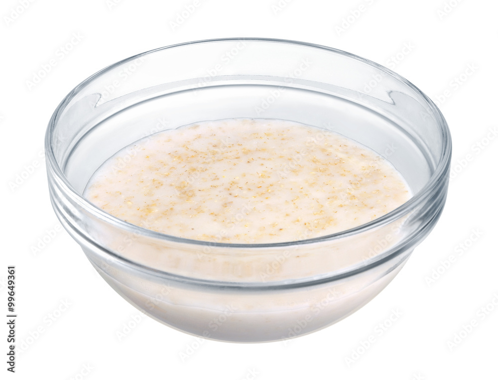 Oatmeal in a glass bowl on white background Oatmeal in a glass bowl on white background