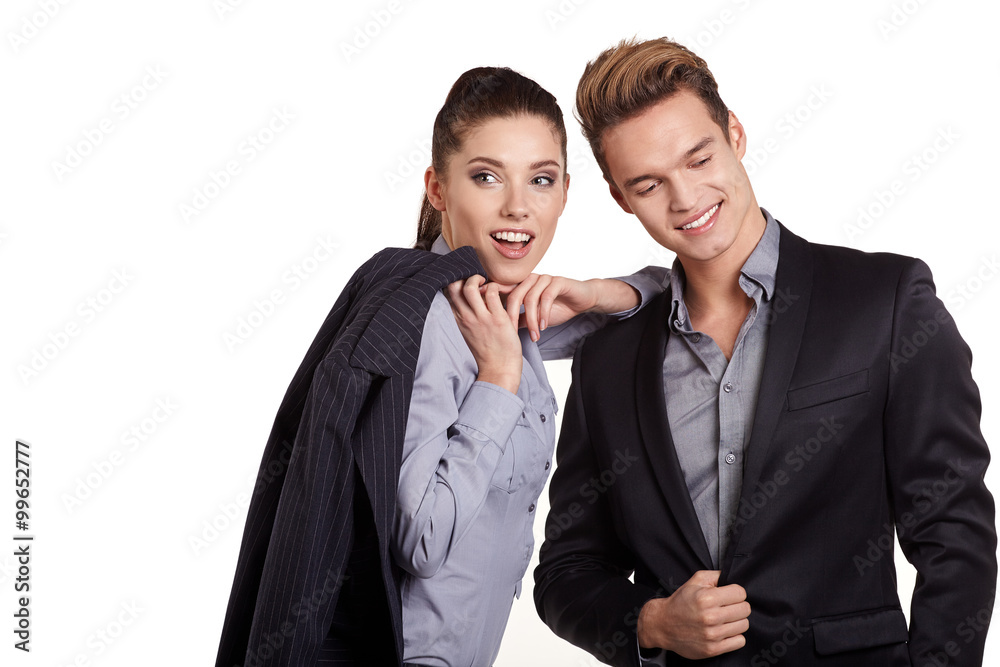 Portrait Of Happy Business Couple Standing Together Isolated On Portrait Of Happy Business Couple Standing Together Isolated On