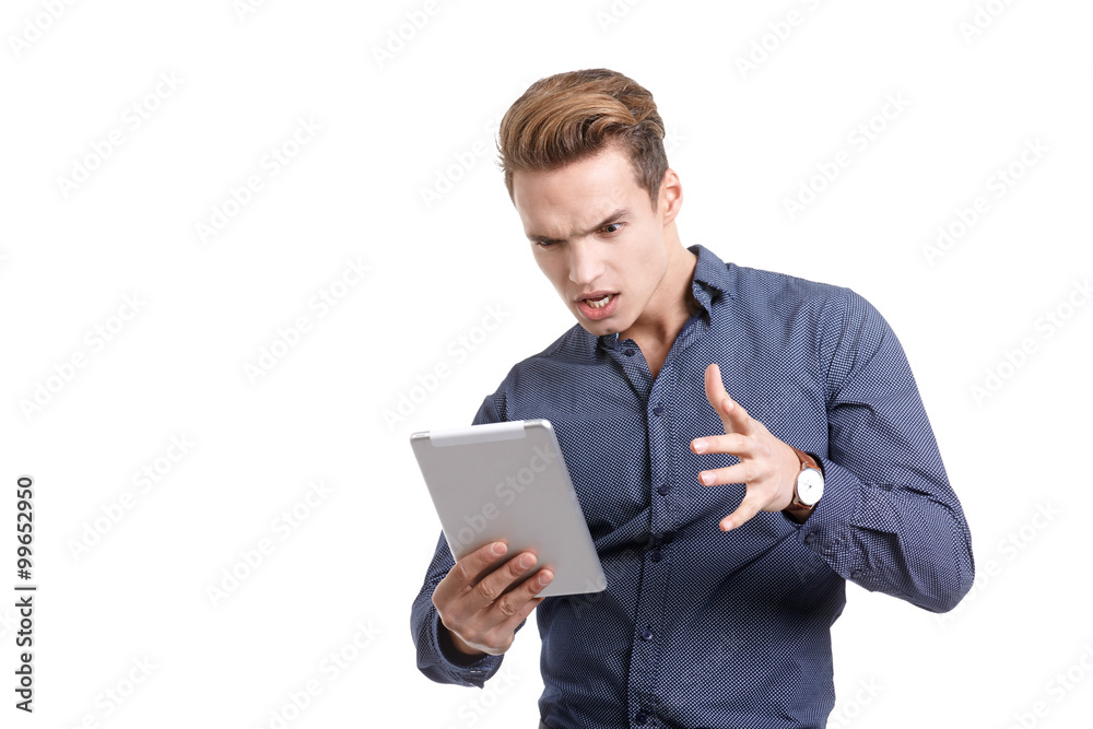 frustrated young man with tablet frustrated young man with tablet