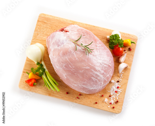 Fresh raw pork on cutting board on white background 