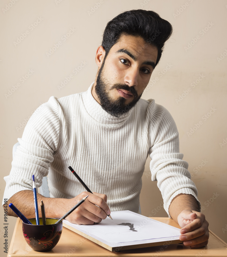 Artist young boy drawing or sketching on white paper Artist young boy drawing or sketching on white paper