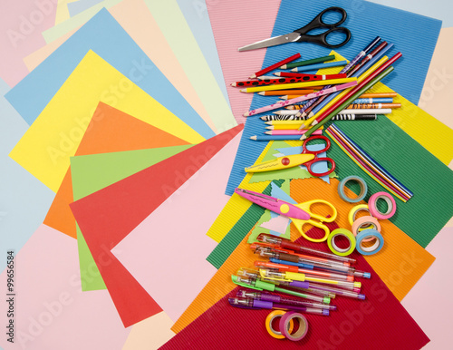 Arts and craft supplies.  Corrugated color paper, pencils, different washi tapes, craft scissors.