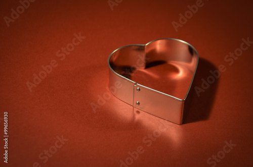 Valentines Card with heart shape on vivid red background