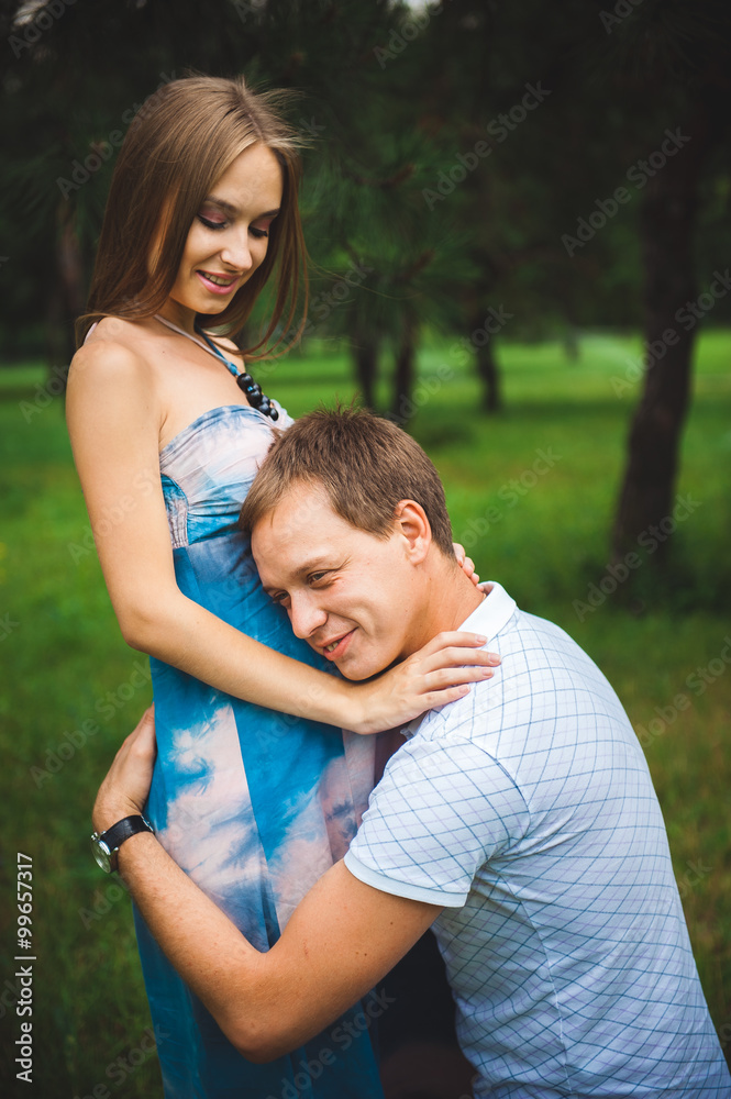 Fototapeta premium Pregnant Couple on the park