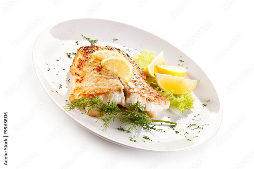 Fish dish - fried fish fillet and vegetables Fish dish - fried fish fillet and vegetables