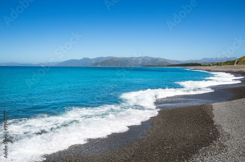 Kaioura beach with waves  blue sea and blue sky