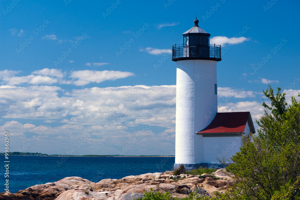 Harbor lighthouse on a summer day on the Massachusetts North Shore.