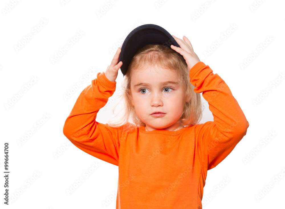 Little Funny girl in baseball cap and orange blouse Little Funny girl in baseball cap and orange blouse