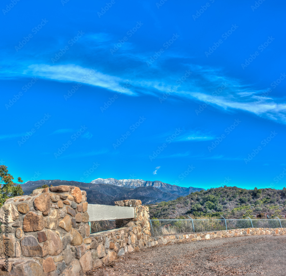 Snowy peak of Topa Topa over Ojai with stonework in foreground. Snowy peak of Topa Topa over Ojai with stonework in foreground.