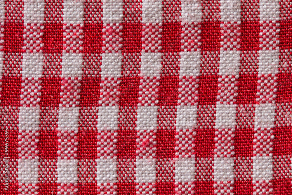 Red tartan closely. Red tartan closely.
