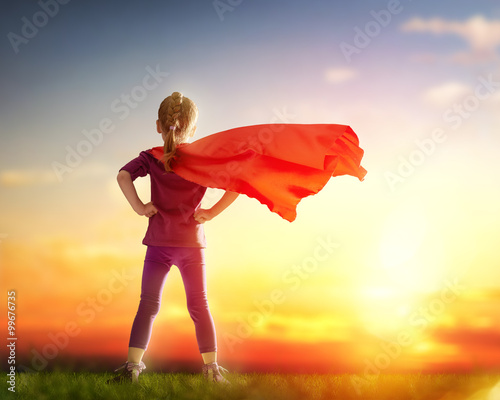 girl plays superhero photo