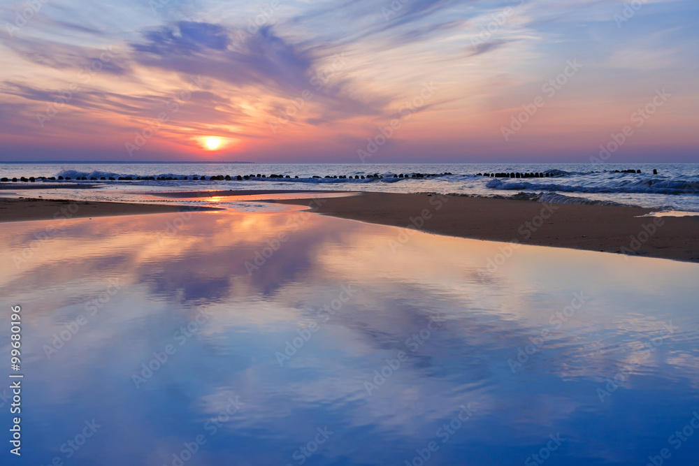 wonderful sea sunset with reflection.