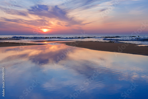 wonderful sea sunset with reflection.