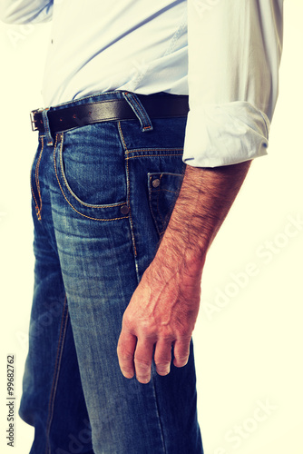 Side view of a men in jeans trousers 