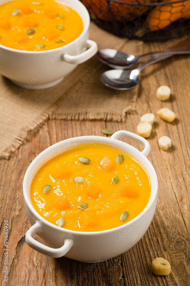 soup, cream of pumpkin served with roasted seeds and croutons. soup, cream of pumpkin served with roasted seeds and croutons.