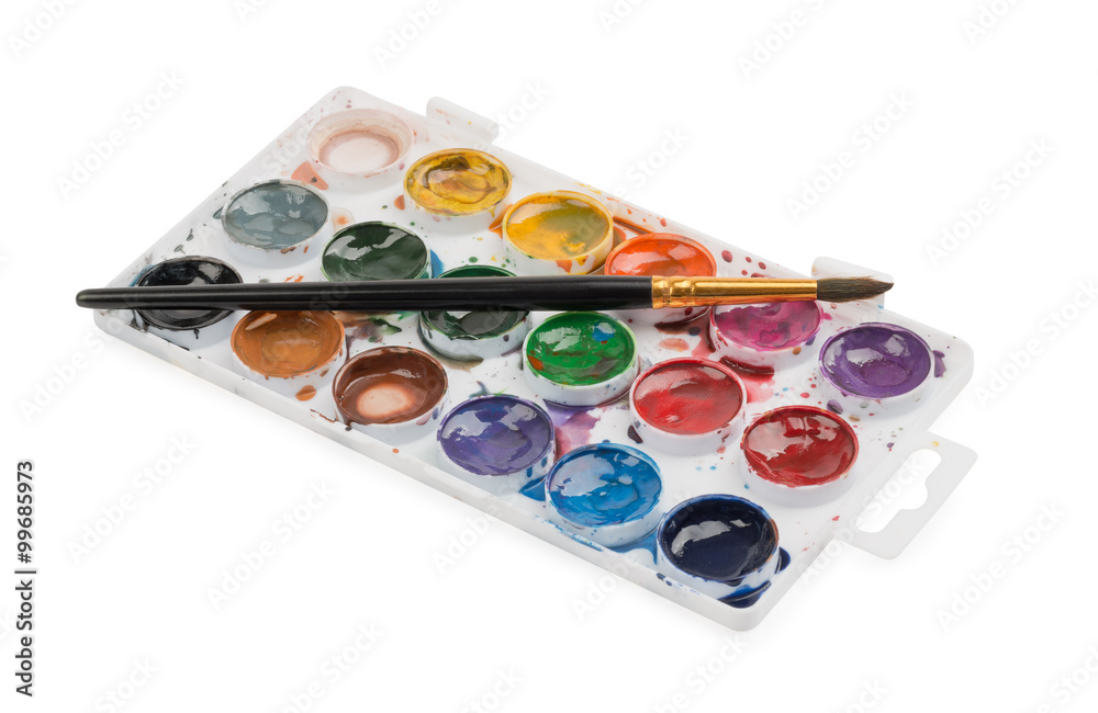 Naklejka premium Watercolor paints in palette with the brush for drawing