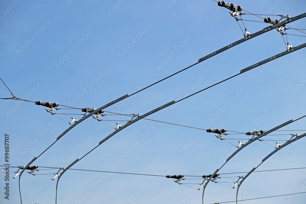 tram wires with blue sky background tram wires with blue sky background