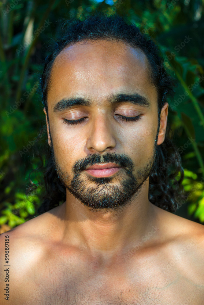Fototapeta premium Bearded handsome man meditating