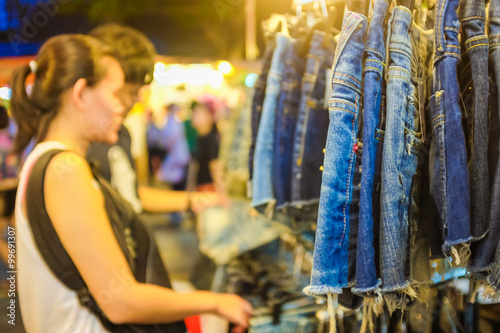 Closeup of blue jeans in a shop