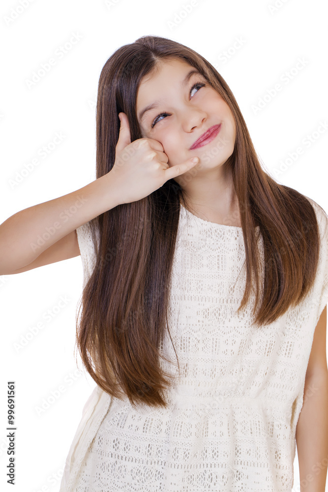 Fototapeta premium One Little Girl making a call me gesture, against white backgrou