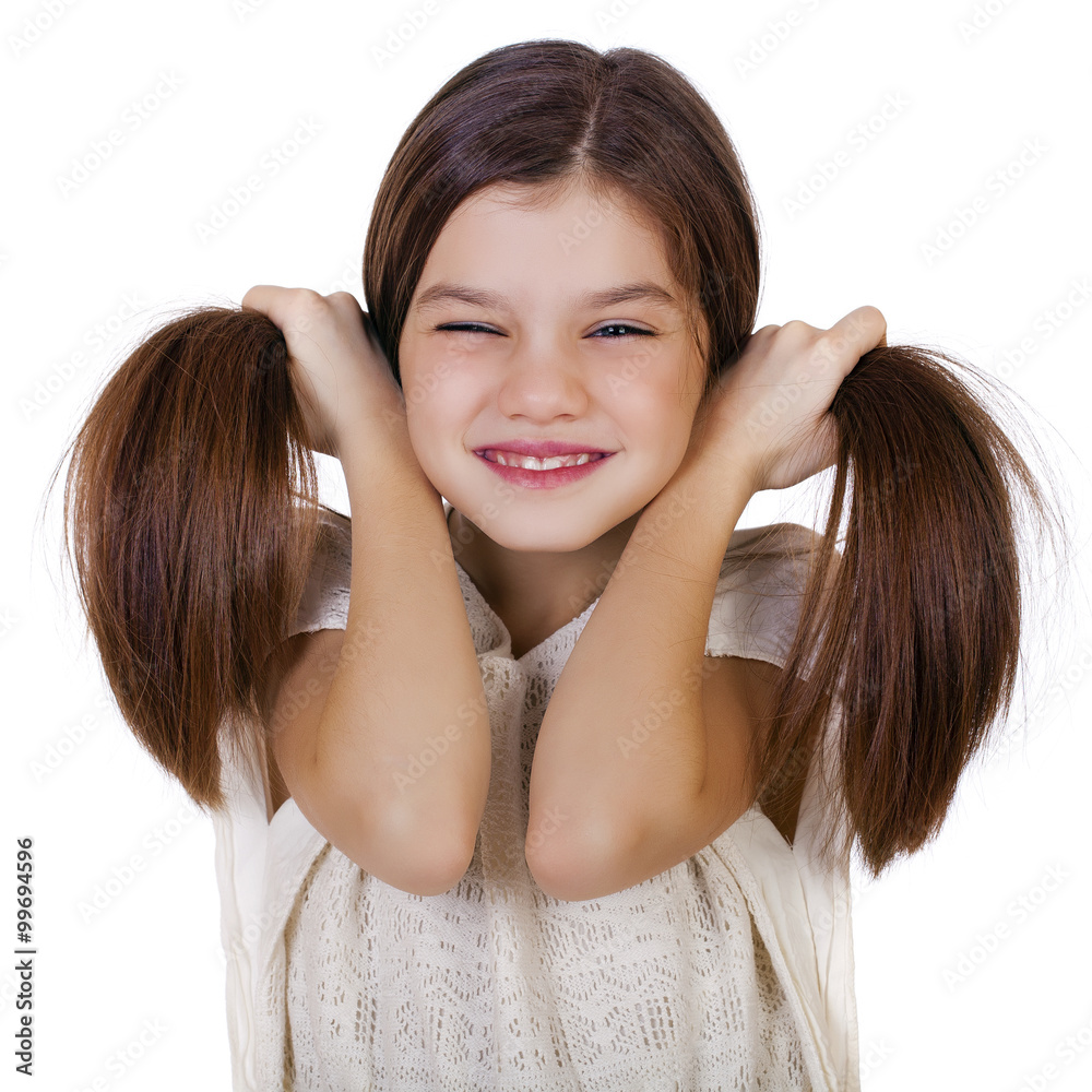 Portrait of a charming little girl smiling at camera Portrait of a charming little girl smiling at camera