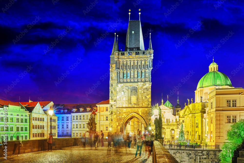 Fototapeta premium Tower on Charles Bridge at nighttime. Czech Republic.
