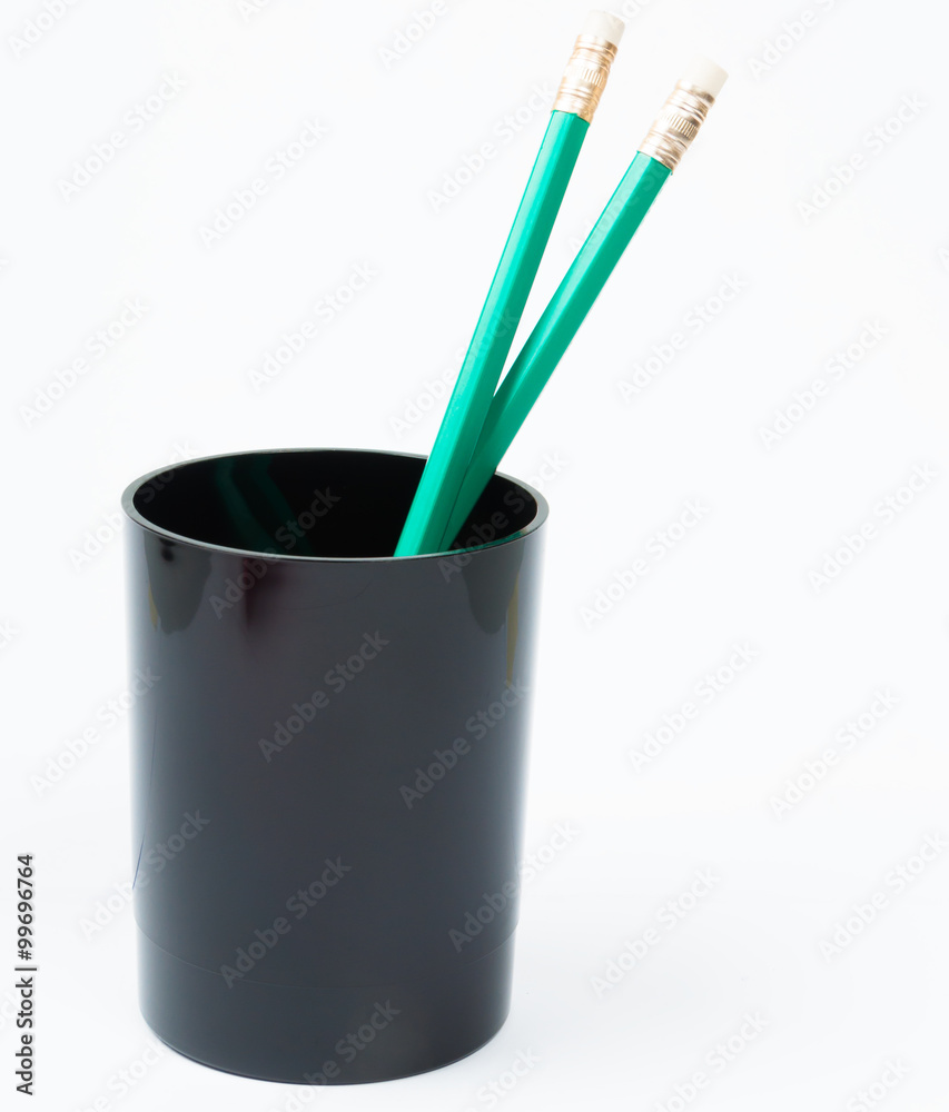 green pencil in the black holder green pencil in the black holder