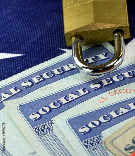 Padlock and social security card - Identity theft and identity protection concept