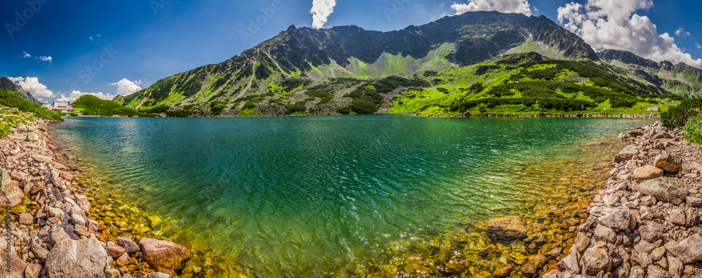 Panorama of crystal clear pond in the Tatra Mountains