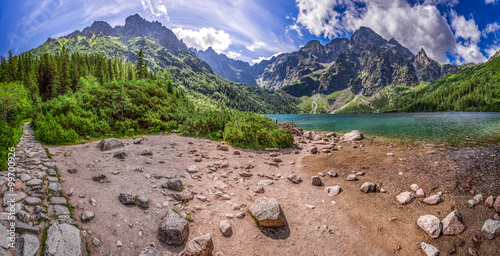 Panorama of beautiful lake in the mountains at summer