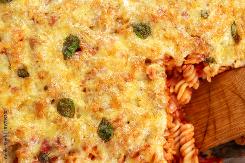 Tuna Pasta Bake with cheese and tomatoes. view from top