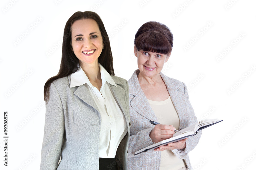 Successful business woman smiling portrait and her assistant with notepad and files. Portrait in office Successful business woman smiling portrait and her assistant with notepad and files. Portrait in office