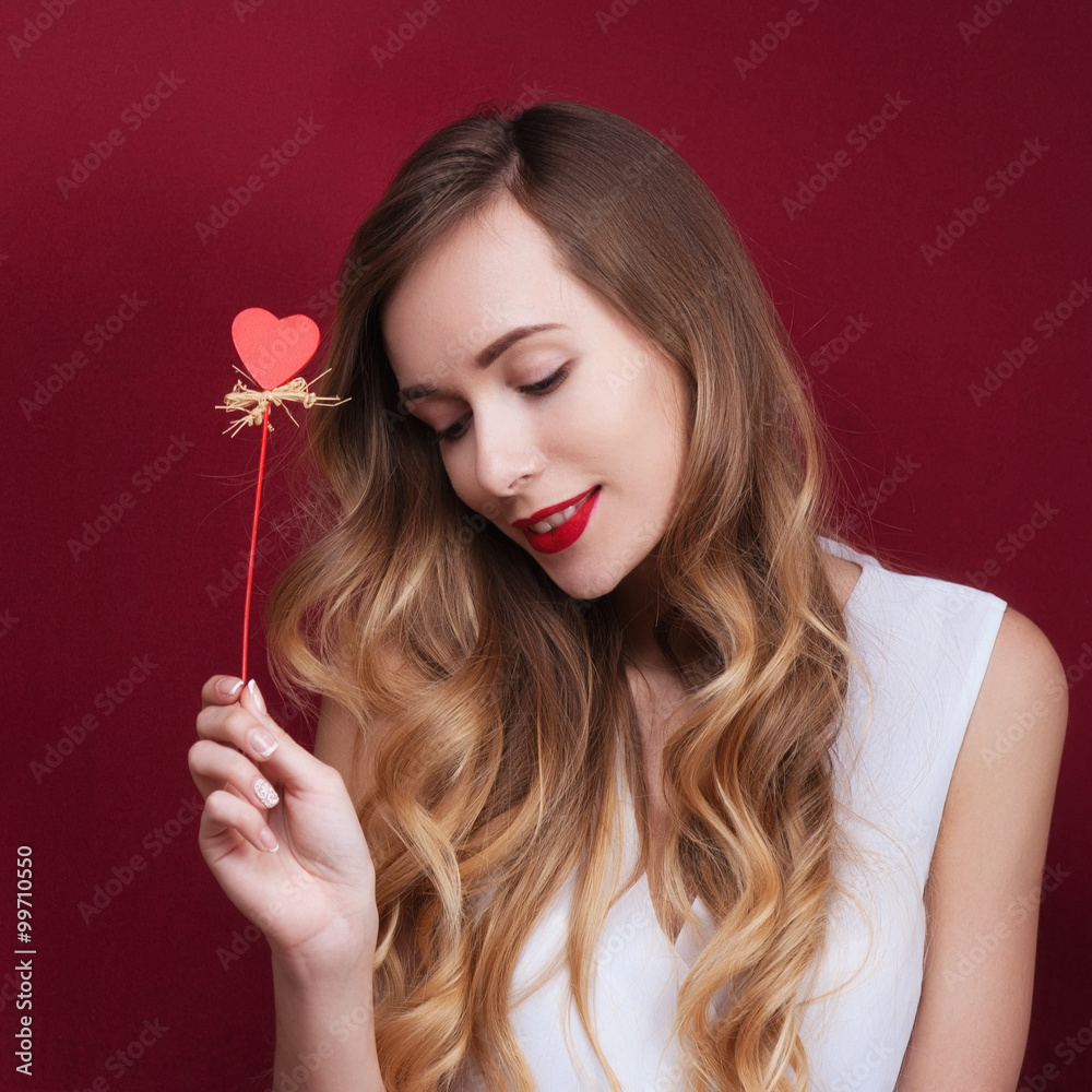 Fototapeta premium Elegant and fashion woman holding heart