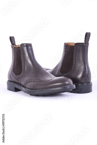 Men's classic brown shoes on a white background