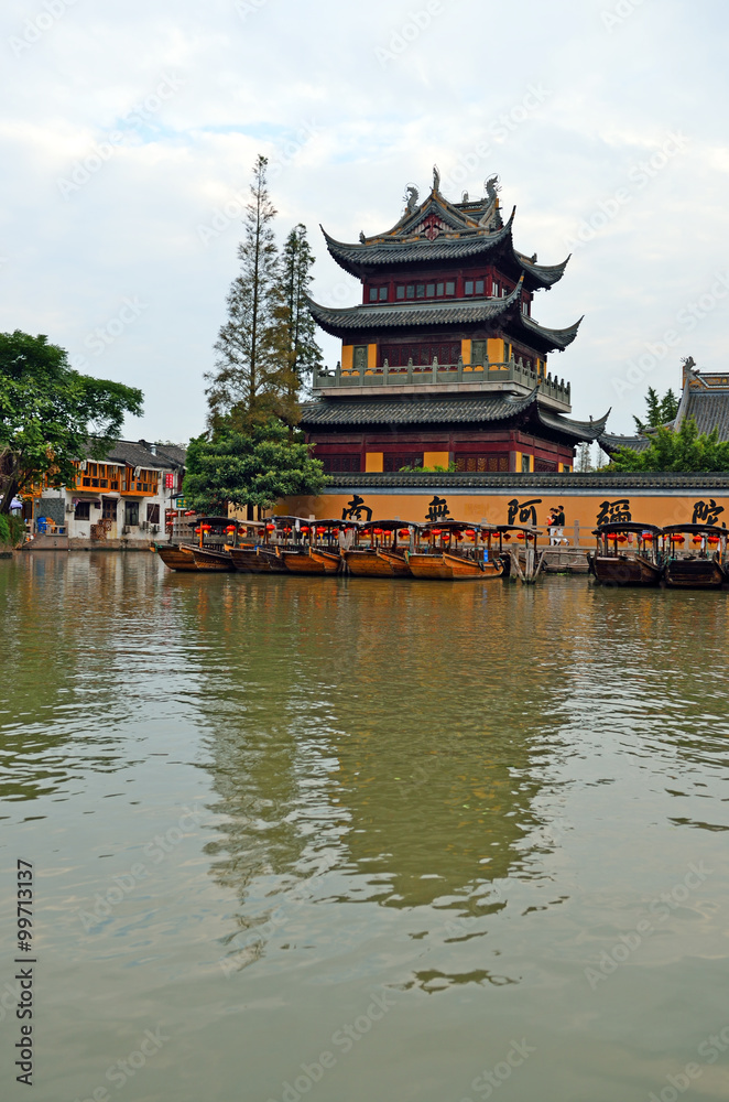 Old village by river in Shanghai with boat.. Old village by river in Shanghai with boat..