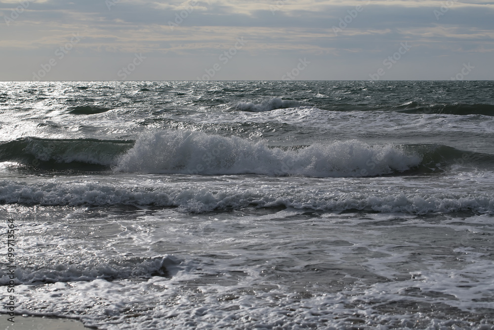 Sea waves on murky day