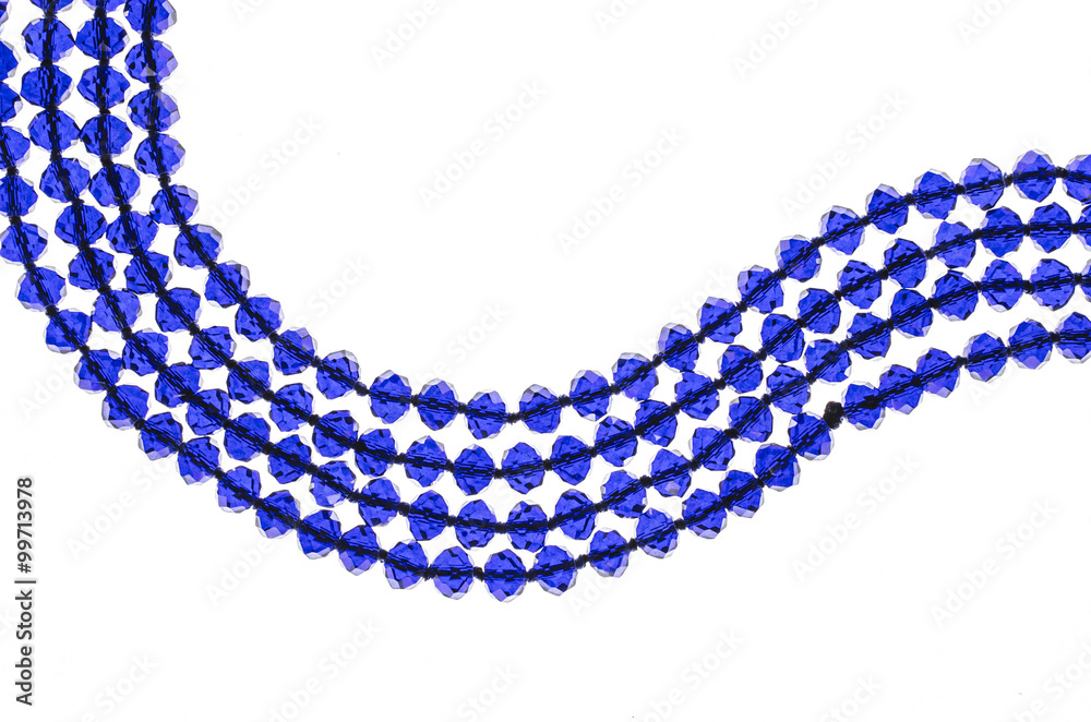blue beads on a white background blue beads on a white background