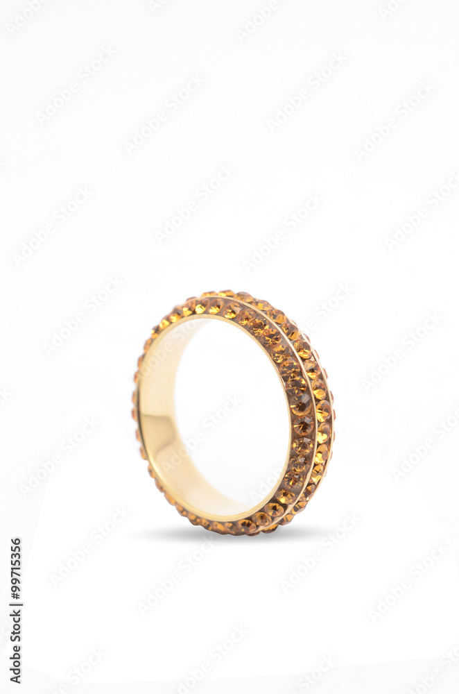 ring with amber stones on a white background ring with amber stones on a white background