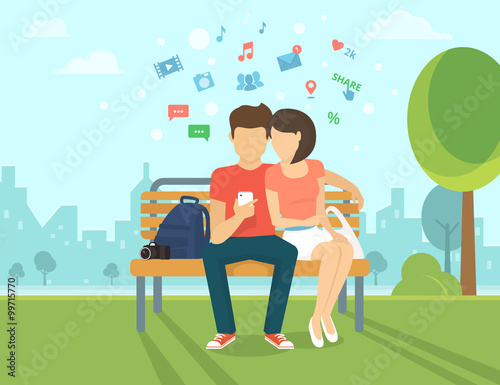 Couple with smartphone outdoors