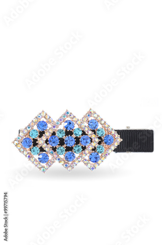 barrette with blue stones on white background
