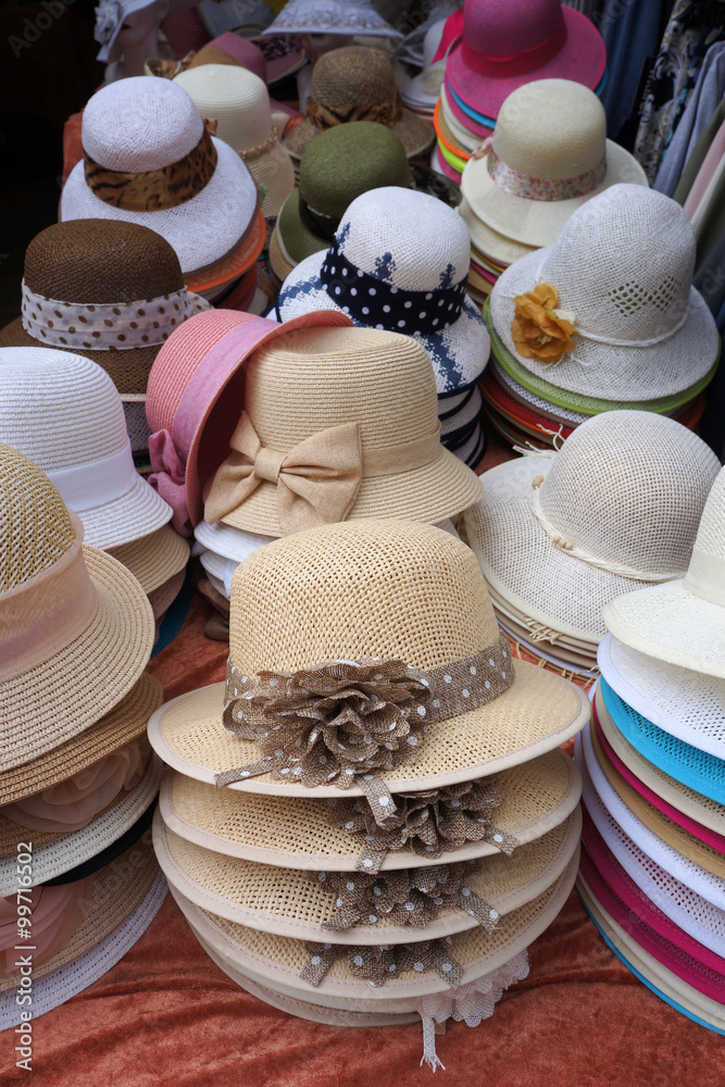 Decorated ladies' hats for sale.