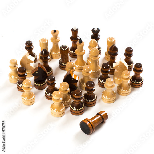 wooden chessmen on a white background