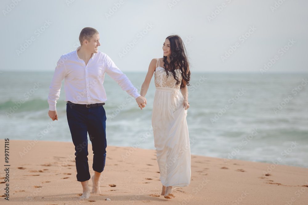 Romantic loving couple on the beach