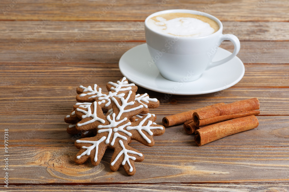 Gingerbread cookies, Cup of hot Cappuccino and Cinnamon Gingerbread cookies, Cup of hot Cappuccino and Cinnamon