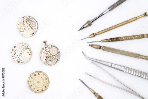 watchmaker tools isolated on white photo
