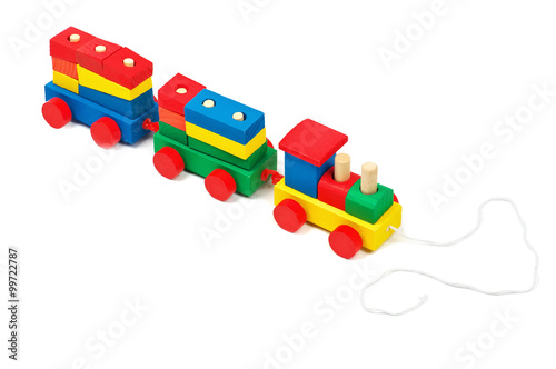 Wooden colorful toy train with rope isolated on white background