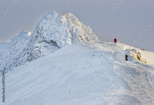 People climbing on top of Kasprowy Wierch of Zakopane in winter © Roman Babakin